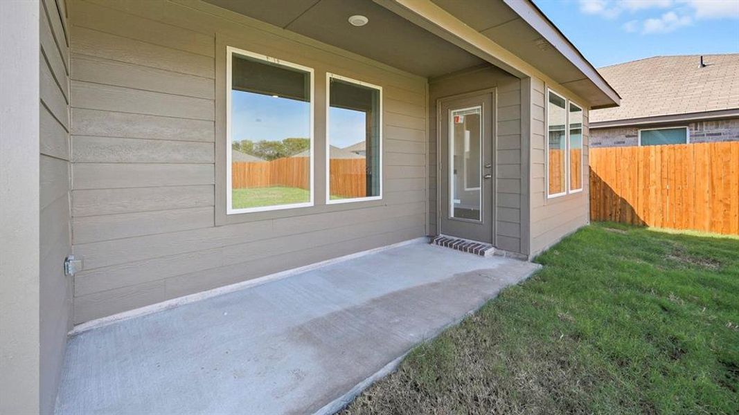 Property entrance with a patio area Property entrance with a patio area