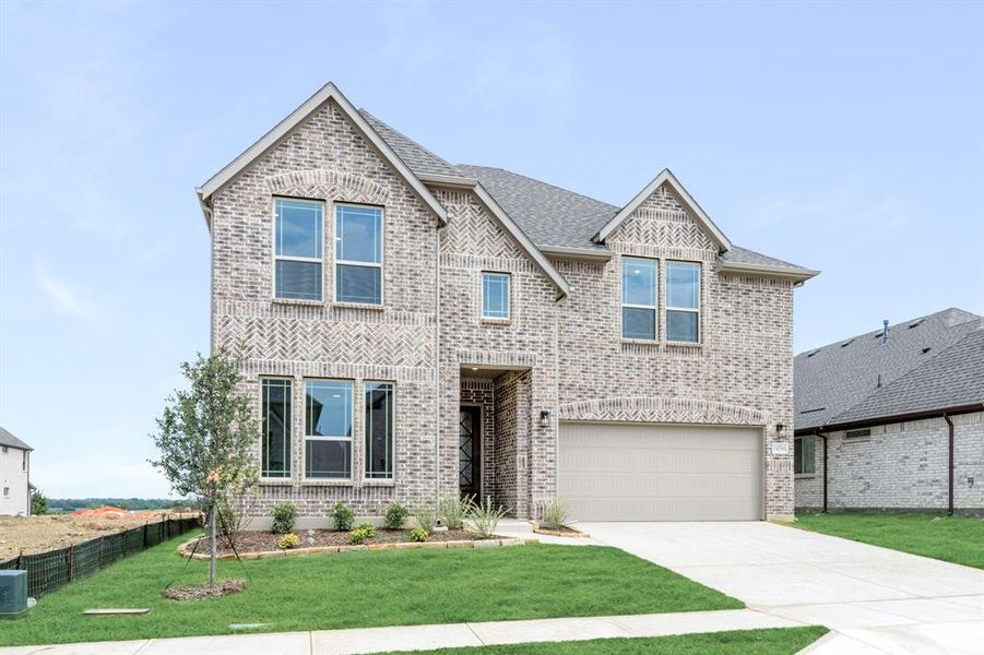 Front exterior of a new home in Creekview Meadows, Pilot Point, TX, highlighting curb appeal (Image 20). Front exterior of a new home in Creekview Meadows, Pilot Point, TX, highlighting curb appeal (Image 20).