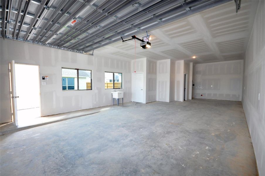 First floor of garage 1 included a utility sink for those messy tasks and a full bath to the rear.