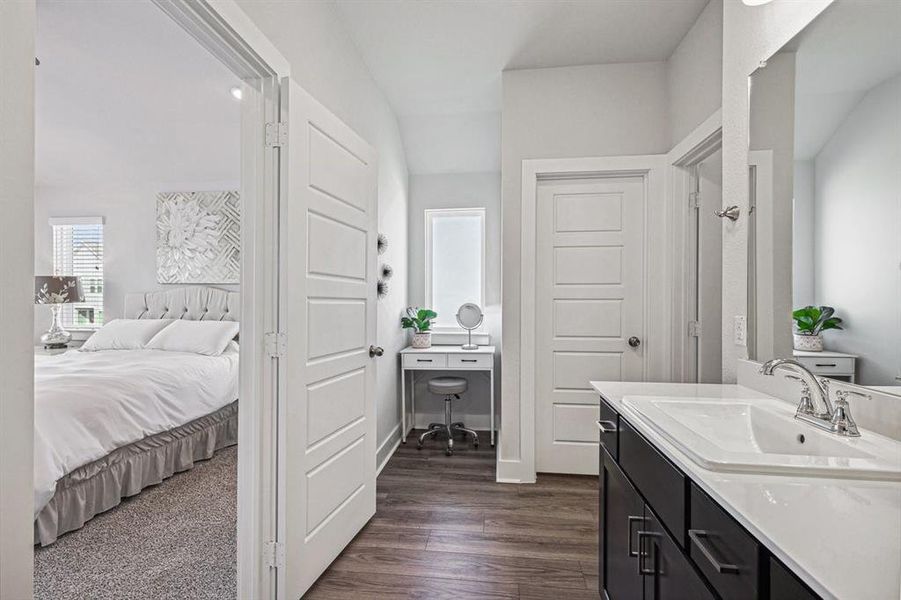 Bathroom featuring vanity space and toilet room