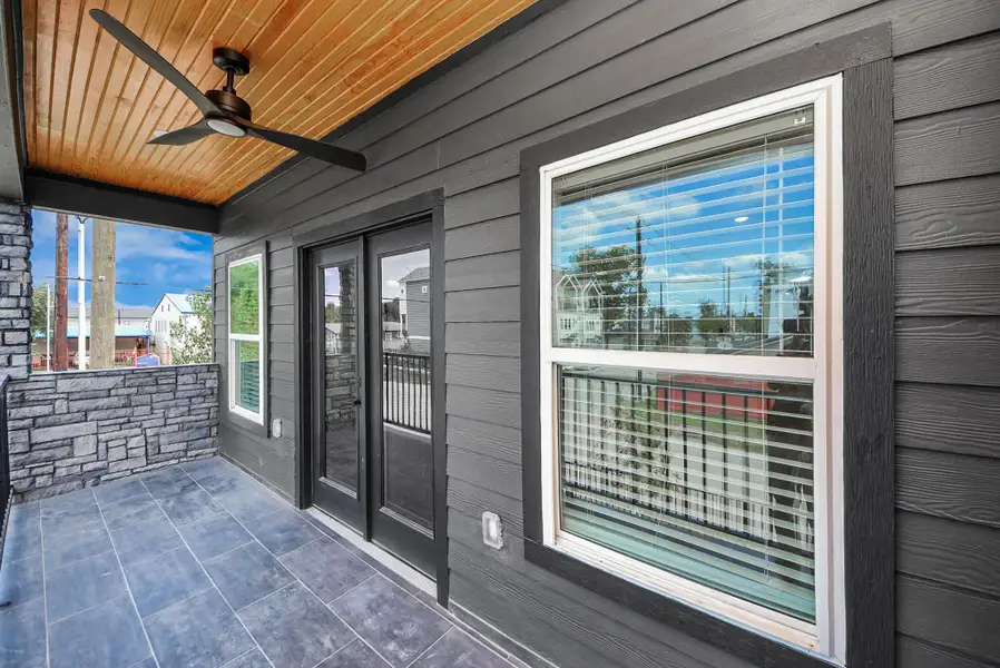 Exterior details and patio area of a home in , Houston (Image 3).