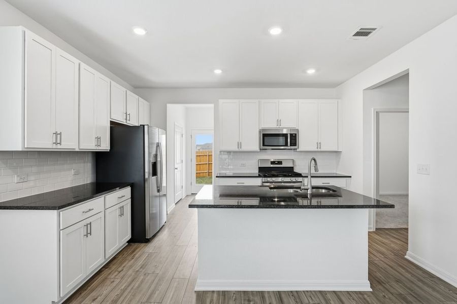 Furnished interior view inside a new home in Longview, Del Valle (Image 4).