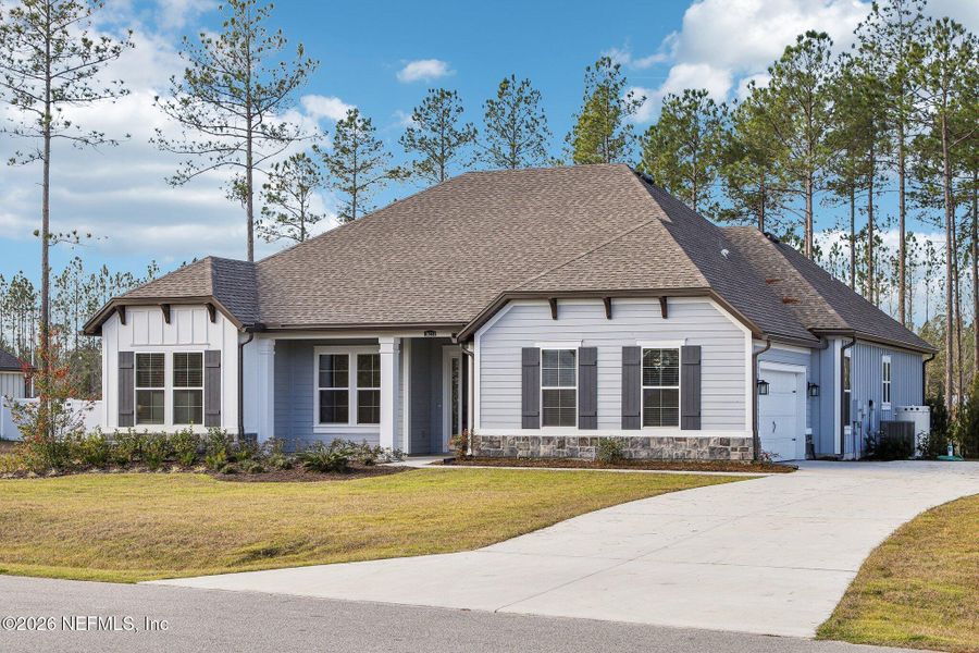Front exterior of a new home in , Hilliard, FL, highlighting curb appeal (Image 25). Front exterior of a new home in , Hilliard, FL, highlighting curb appeal (Image 25).