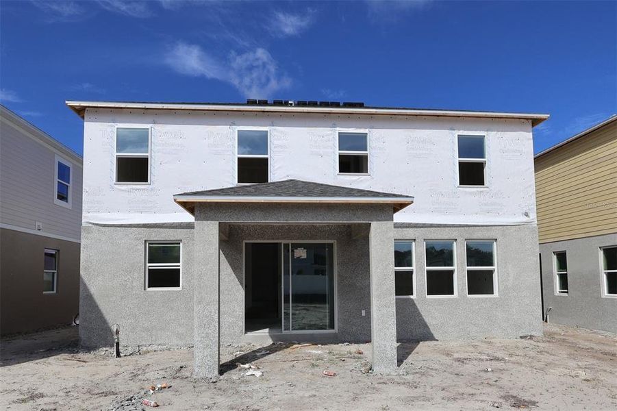 Exterior details and patio area of a home in Estates at Rivercrest, Sanford (Image 15). Exterior details and patio area of a home in Estates at Rivercrest, Sanford (Image 15).