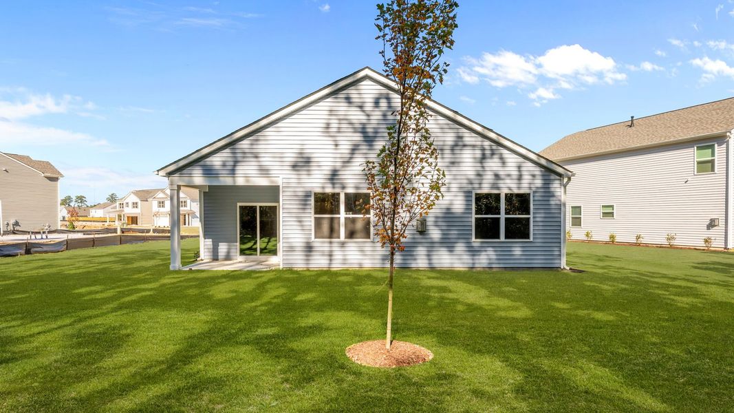 Exterior details and patio area of a home in West New Bern, New Bern (Image 21).