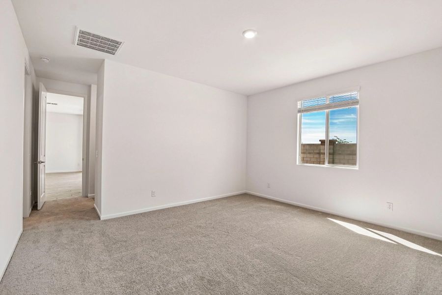 Primary suite. Not actual home, finishes and options may vary by community.