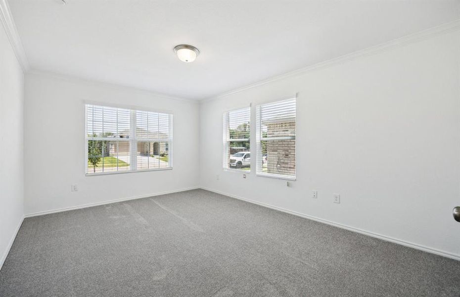 Spacious secondary bedroom features ample closet space *Real home pictured Spacious secondary bedroom features ample closet space *Real home pictured