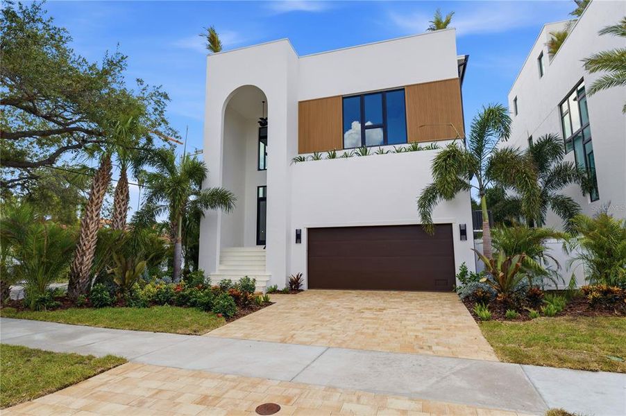Front exterior of a new home in , Tampa, FL, highlighting curb appeal (Image 31). Front exterior of a new home in , Tampa, FL, highlighting curb appeal (Image 31).