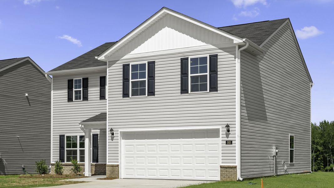 Front exterior of a new home in Greystone North, Stoneville, NC, highlighting curb appeal (Image 2). Front exterior of a new home in Greystone North, Stoneville, NC, highlighting curb appeal (Image 2).