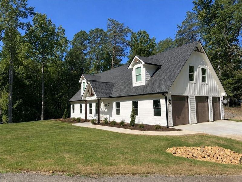 Front exterior of a new home in , Gainesville, GA, highlighting curb appeal (Image 21). Front exterior of a new home in , Gainesville, GA, highlighting curb appeal (Image 21).