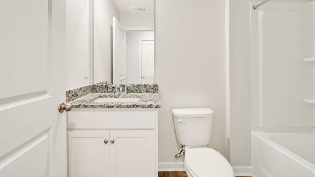 Furnished interior view inside a new home in Grayson Park, Leland (Image 10).