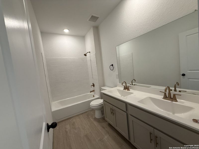 Furnished interior view inside a new home in Enclave at Hennersby Hollow 50's, San Antonio (Image 11).