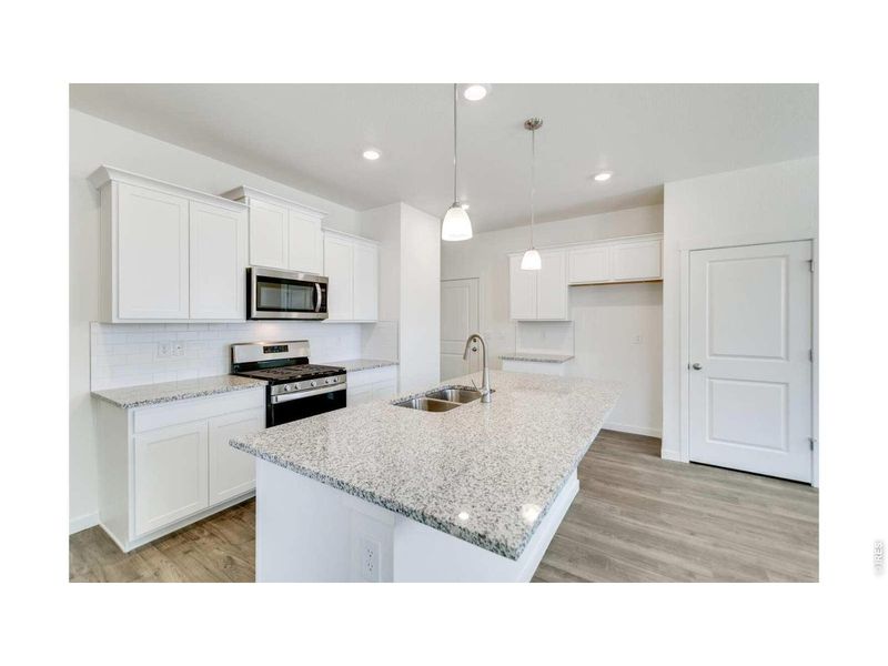Furnished interior view inside a new home in Prairie Song, Windsor (Image 5).