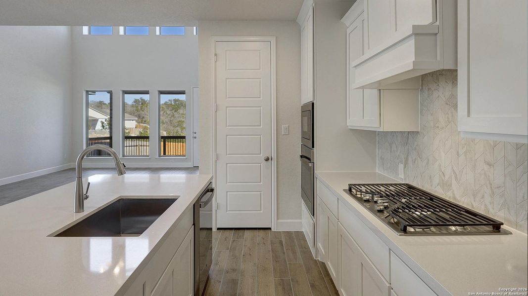 Furnished interior view inside a new home in Ladera, San Antonio (Image 6).