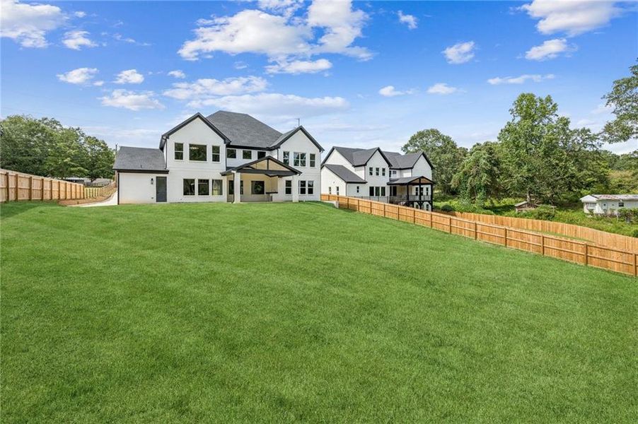 Front exterior of a new home in , Hoschton, GA, highlighting curb appeal (Image 2). Front exterior of a new home in , Hoschton, GA, highlighting curb appeal (Image 2).