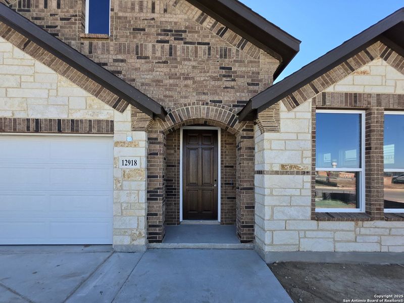 Exterior details and patio area of a home in The Heritage at Saddlebrook Ranch 70's, Schertz (Image 4).