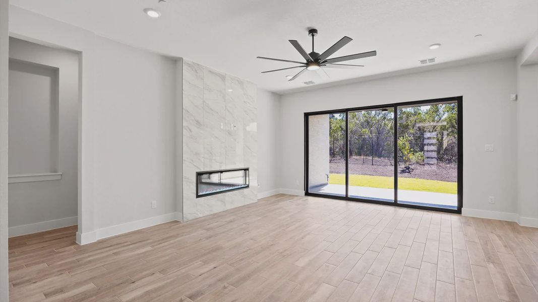 Representative unfurnished interior of a home built from the Raegan by Chesmar Homes in Sweetwater, Austin (Image 12). Representative unfurnished interior of a home built from the Raegan by Chesmar Homes in Sweetwater, Austin (Image 12).