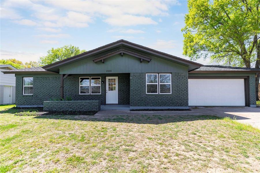 Front exterior of a new home in , Brownwood, TX, highlighting curb appeal (Image 1). Front exterior of a new home in , Brownwood, TX, highlighting curb appeal (Image 1).