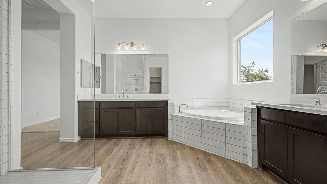 Representative furnished interior of a home built from the Granada by DRB Homes in Windrose, Waddell (Image 15).