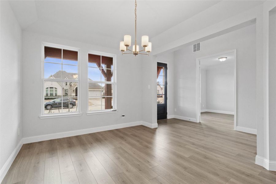 Additional view from Formal Dining Room looking out towards entryway and Study.
