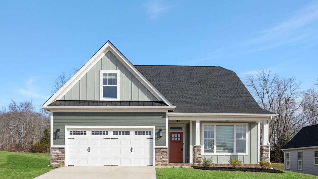 Front exterior of a new home in Arrowood Acres, Enoree, SC, highlighting curb appeal (Image 1). Front exterior of a new home in Arrowood Acres, Enoree, SC, highlighting curb appeal (Image 1).