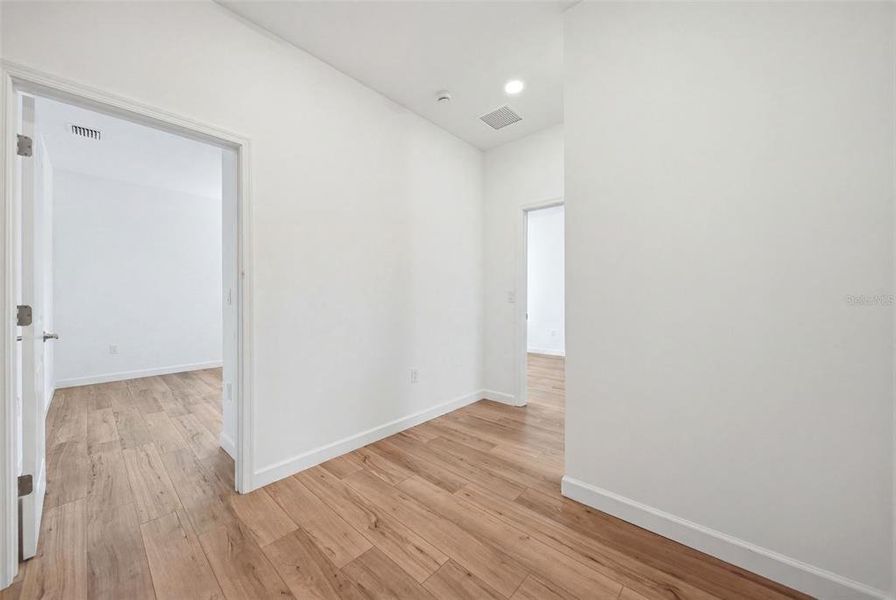Spacious, unfurnished interior of a new home in The Timbers at Everlands, Palm Bay (Image 37).
