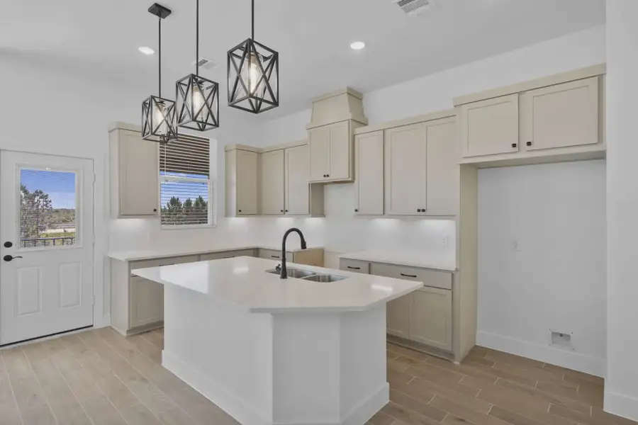 Representative furnished interior of a home built from the Margaux by Chesmar Homes in Bridgeland Chateau, Cypress (Image 5).