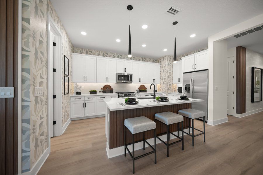 Representative furnished interior of a home built from the Galley by Homes by Towne in Shellstone at Waterside, Sarasota (Image 9). Representative furnished interior of a home built from the Galley by Homes by Towne in Shellstone at Waterside, Sarasota (Image 9).