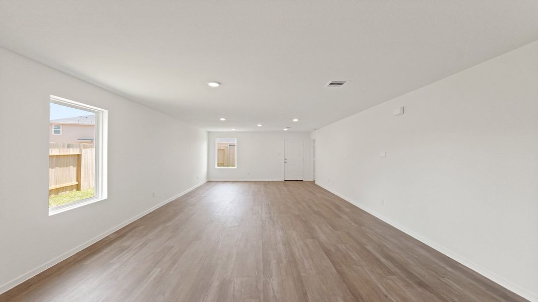 Representative unfurnished interior of a home built from the Estero by D.R. Horton in Lake Conroe Cove, Willis (Image 15). Representative unfurnished interior of a home built from the Estero by D.R. Horton in Lake Conroe Cove, Willis (Image 15).
