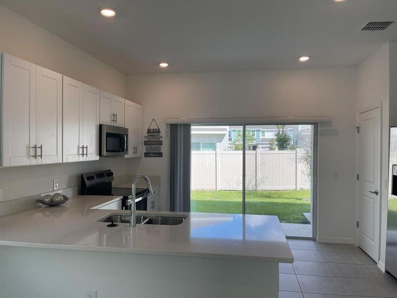 Furnished interior view inside a new home in , Kissimmee (Image 6).