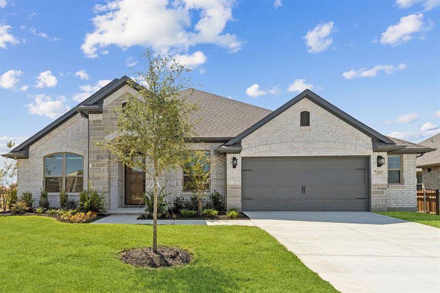 Front exterior of a new home in Silo Mills, Joshua, TX, highlighting curb appeal (Image 1).