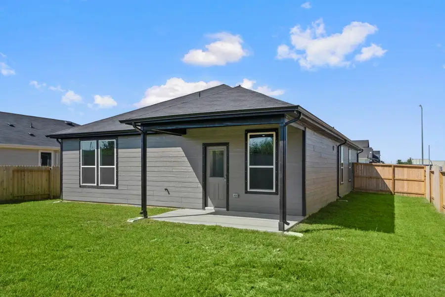 Front exterior of a new home in Windcress, Cove, TX, highlighting curb appeal (Image 2). Front exterior of a new home in Windcress, Cove, TX, highlighting curb appeal (Image 2).