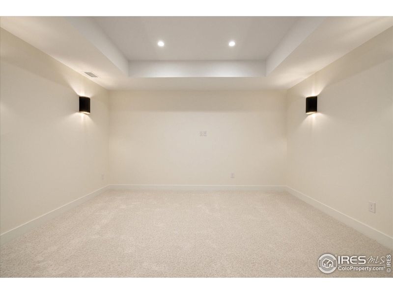 This Theater Room is just waiting for your audio video equipment and TV for a cozy home movie night!  (pre-wiring installed for your easy set-up)