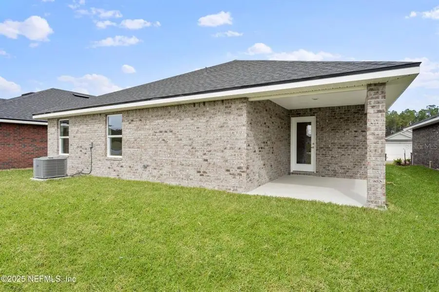 Exterior details and patio area of a home in Palm Coast, Palm Coast (Image 3). Exterior details and patio area of a home in Palm Coast, Palm Coast (Image 3).