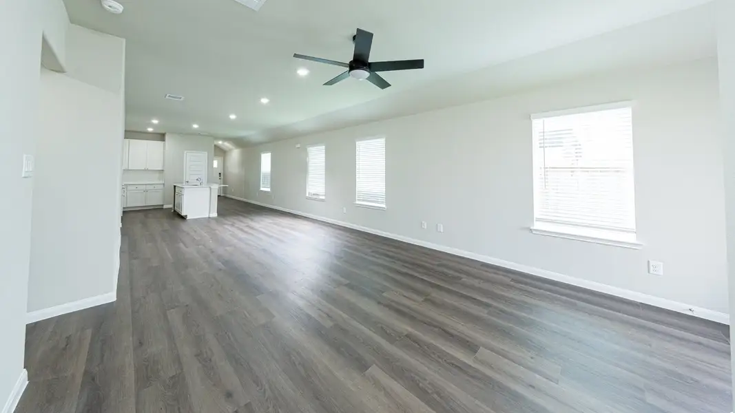 Family Room to Dining Area and Kitchen Family Room to Dining Area and Kitchen