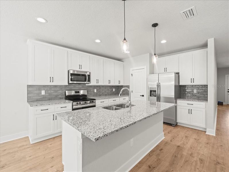 Furnished interior view inside a new home in , Weeki Wachee (Image 7).