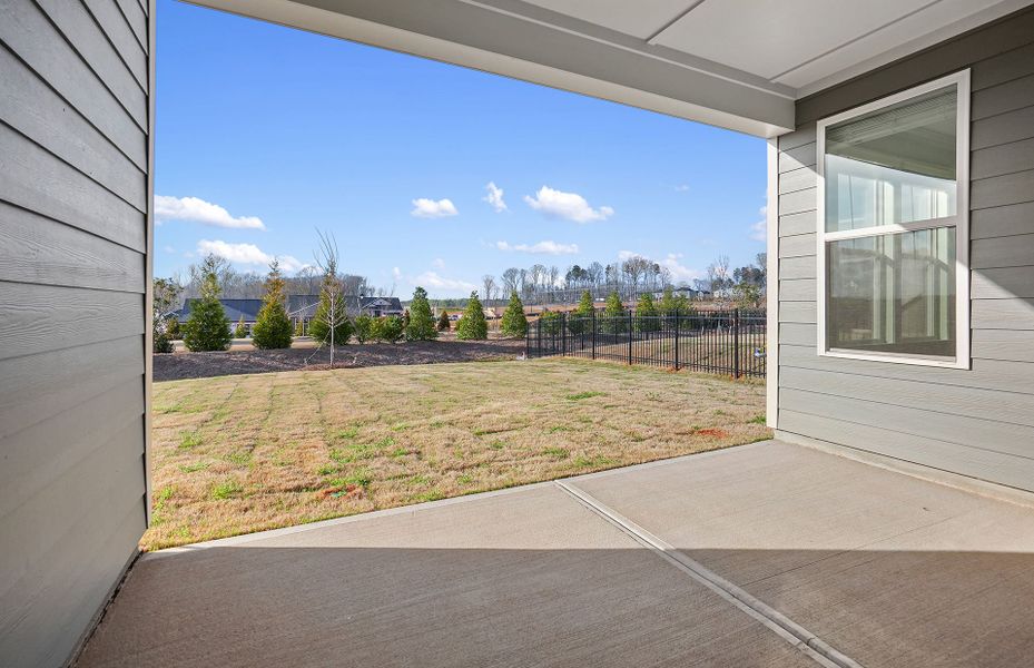 Exterior details and patio area of a home in Carolina Riverside, Belmont (Image 4).