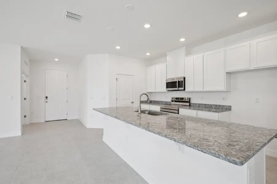 Representative furnished interior of a home built from the Melody by Maronda Homes in Port St. John, Cocoa (Image 9).