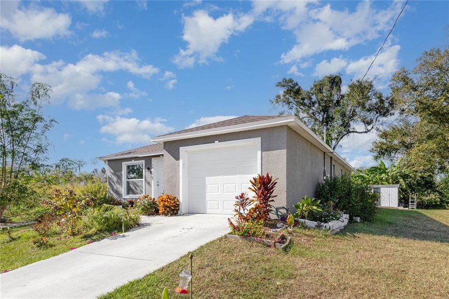 Front exterior of a new home in , Winter Haven, FL, highlighting curb appeal (Image 1). Front exterior of a new home in , Winter Haven, FL, highlighting curb appeal (Image 1).