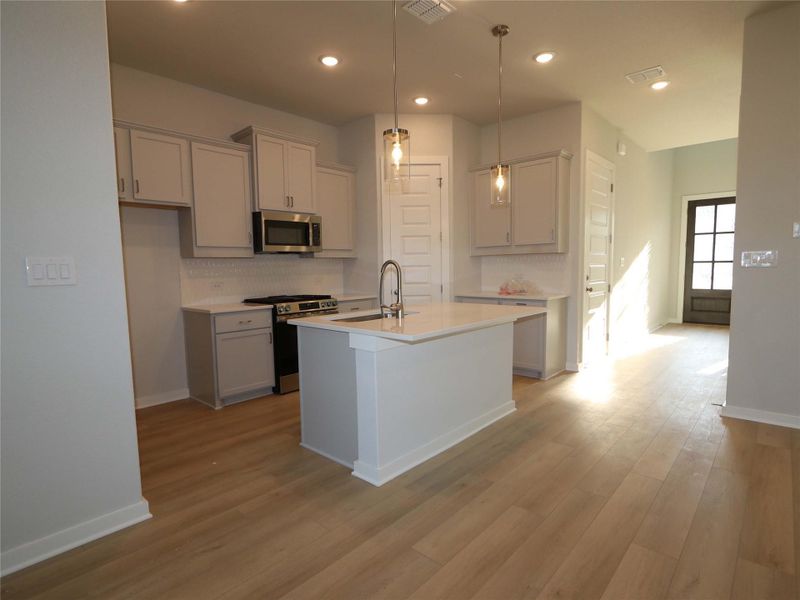 Furnished interior view inside a new home in Estancia West, Manchaca (Image 9). Furnished interior view inside a new home in Estancia West, Manchaca (Image 9).