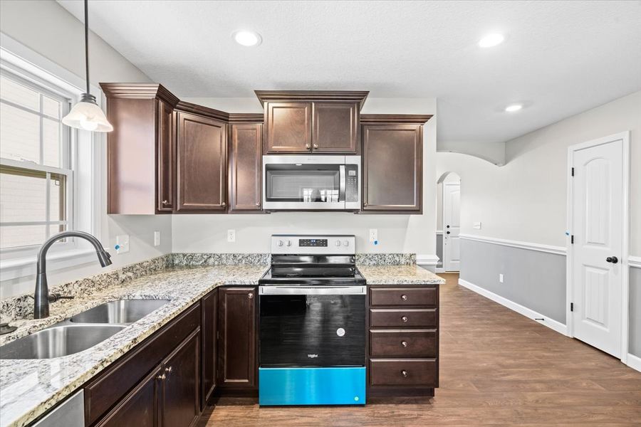 Representative furnished interior of a home built from the Wellford by Enchanted Homes in Hampshire Heights, Moore (Image 8).
