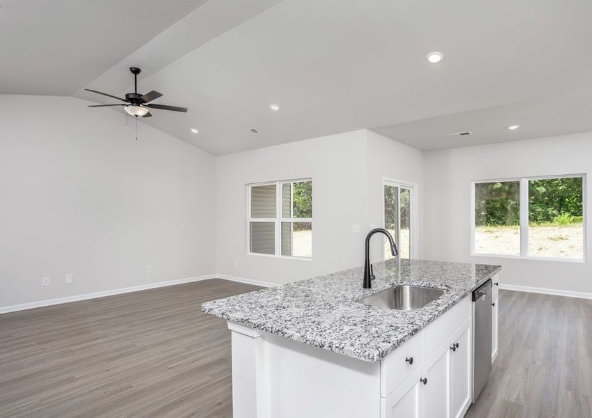 Vinyl flooring throughout.