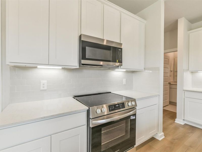 Furnished interior view inside a new home in Spring Branch Crossing, Conroe (Image 15).