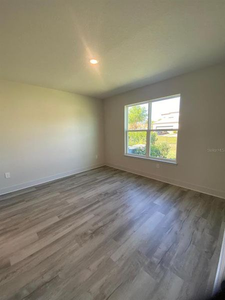Spacious, unfurnished interior of a new home in Summerlake Reserve, Winter Garden (Image 10).