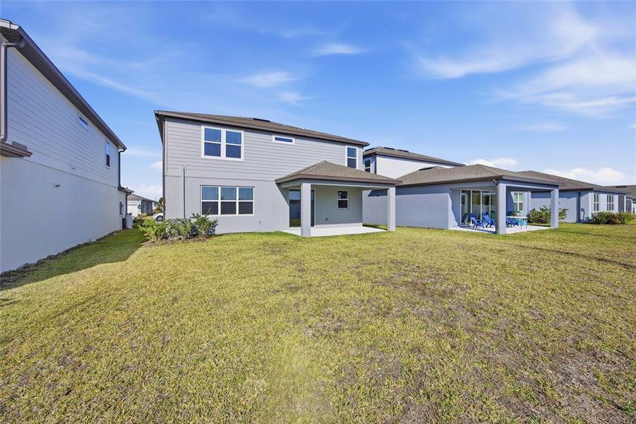 Exterior details and patio area of a home in Marion Ranch, Ocala (Image 33).