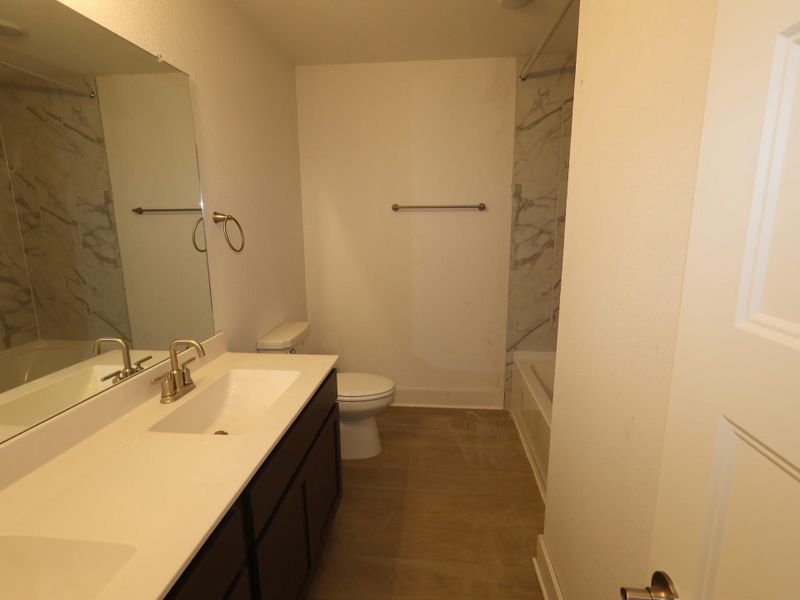 Furnished interior view inside a new home in Hallimore Ranch, Rosenberg (Image 14).