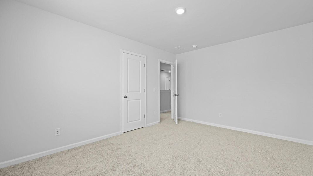 Spacious, unfurnished interior of a new home in Pine Hills Townhomes at Cane Bay, Summerville (Image 18). Spacious, unfurnished interior of a new home in Pine Hills Townhomes at Cane Bay, Summerville (Image 18).