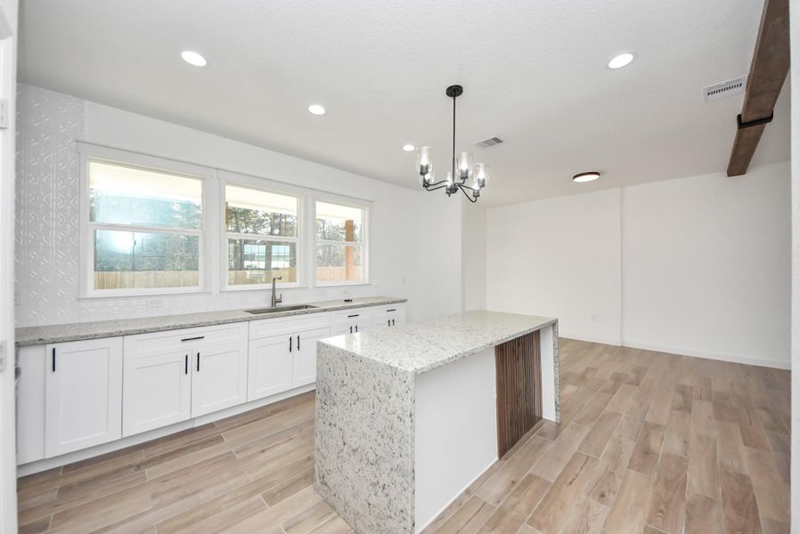 Furnished interior view inside a new home in , Conroe (Image 9).