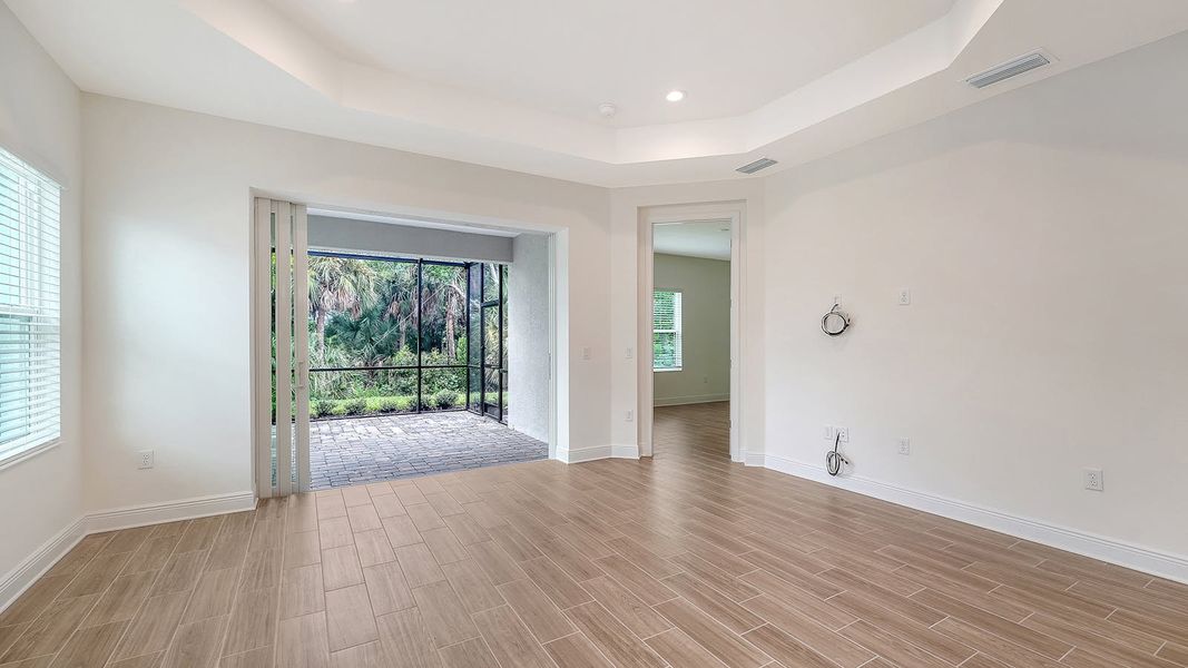 Spacious, unfurnished interior of a new home in Wildleaf Real Estate and Homes for Sale in Parrish, FL - Neal Communities, Parrish (Image 24). Spacious, unfurnished interior of a new home in Wildleaf Real Estate and Homes for Sale in Parrish, FL - Neal Communities, Parrish (Image 24).
