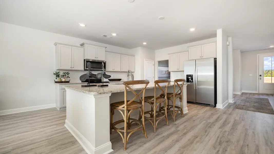 Furnished interior view inside a new home in Brunswick Plantation, Ash (Image 3).